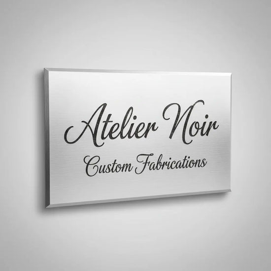Custom laser engraved metal sign with brushed steel finish