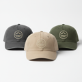 Custom branded hats with embroidered logo in neutral colors